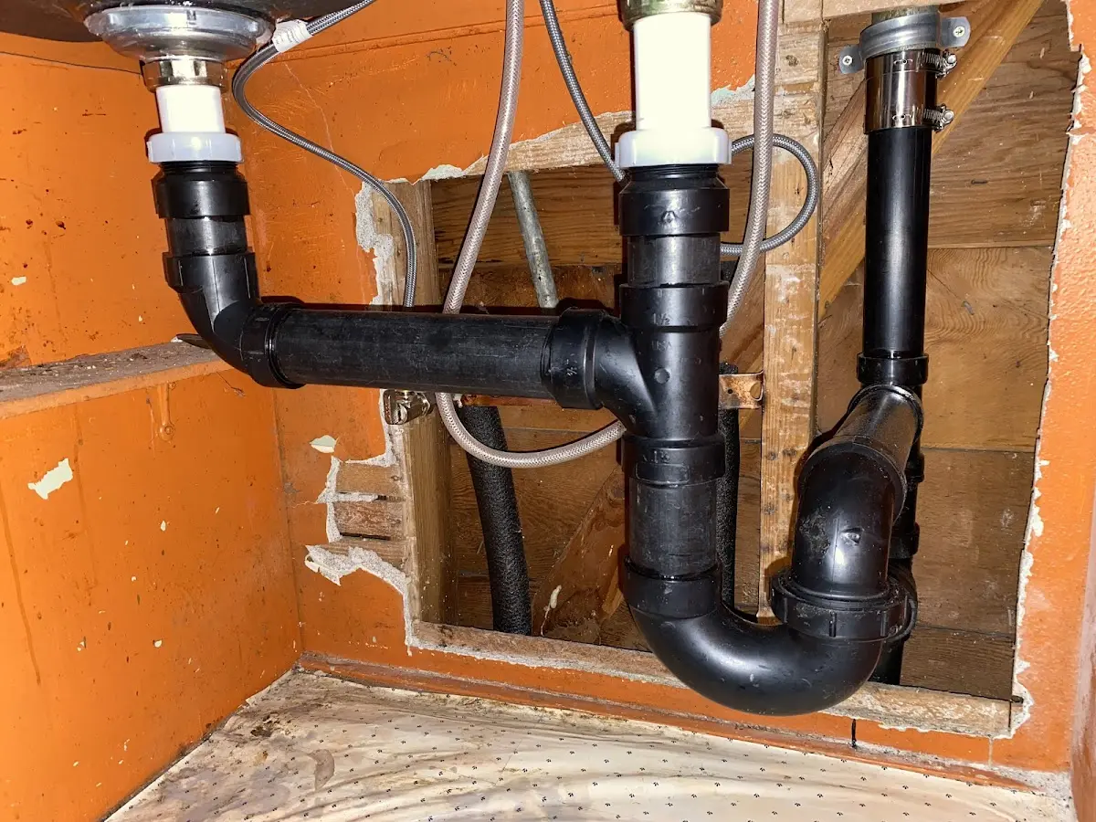 Professional Garbage Disposal Repair equipment and tools on the job in Ponderosa Park